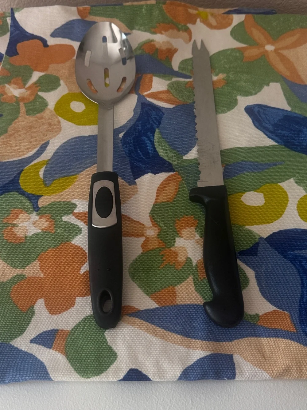 Black-Handled Slotted Serving Spoon and Serrated Knife Set
